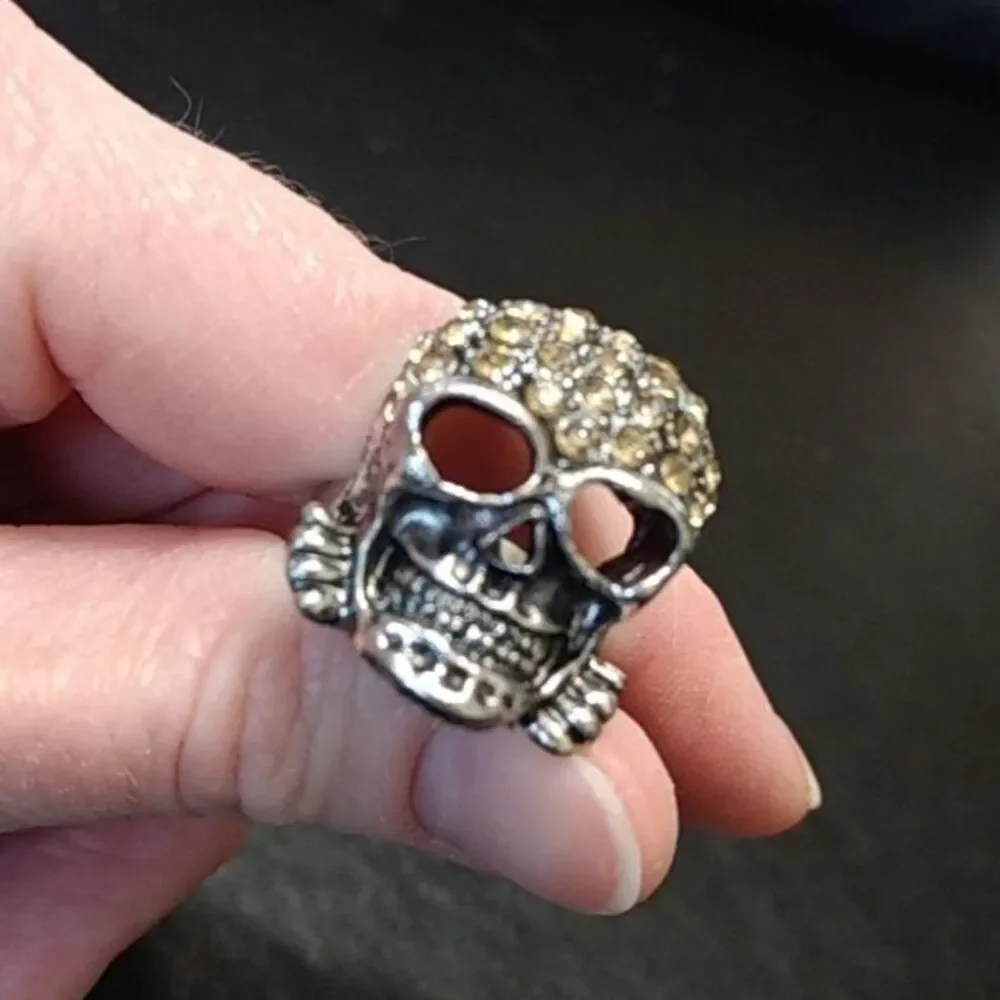 Silver tone and rhinestone skull ring adjustable